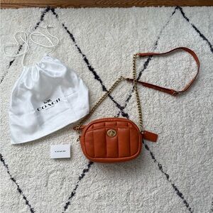 Women’s Coach leather small camera crossbody purse bag